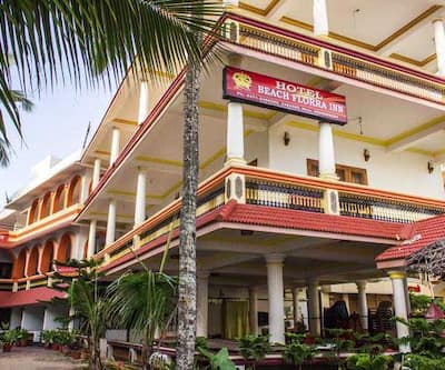 https://imgcld.yatra.com/ytimages/image/upload/t_hotel_yatra_city_desktop/v1433915214/Domestic Hotels/Hotels_Thiruvananthapuram/Hotel Beach Florra Inn/OVERVIEW.jpg